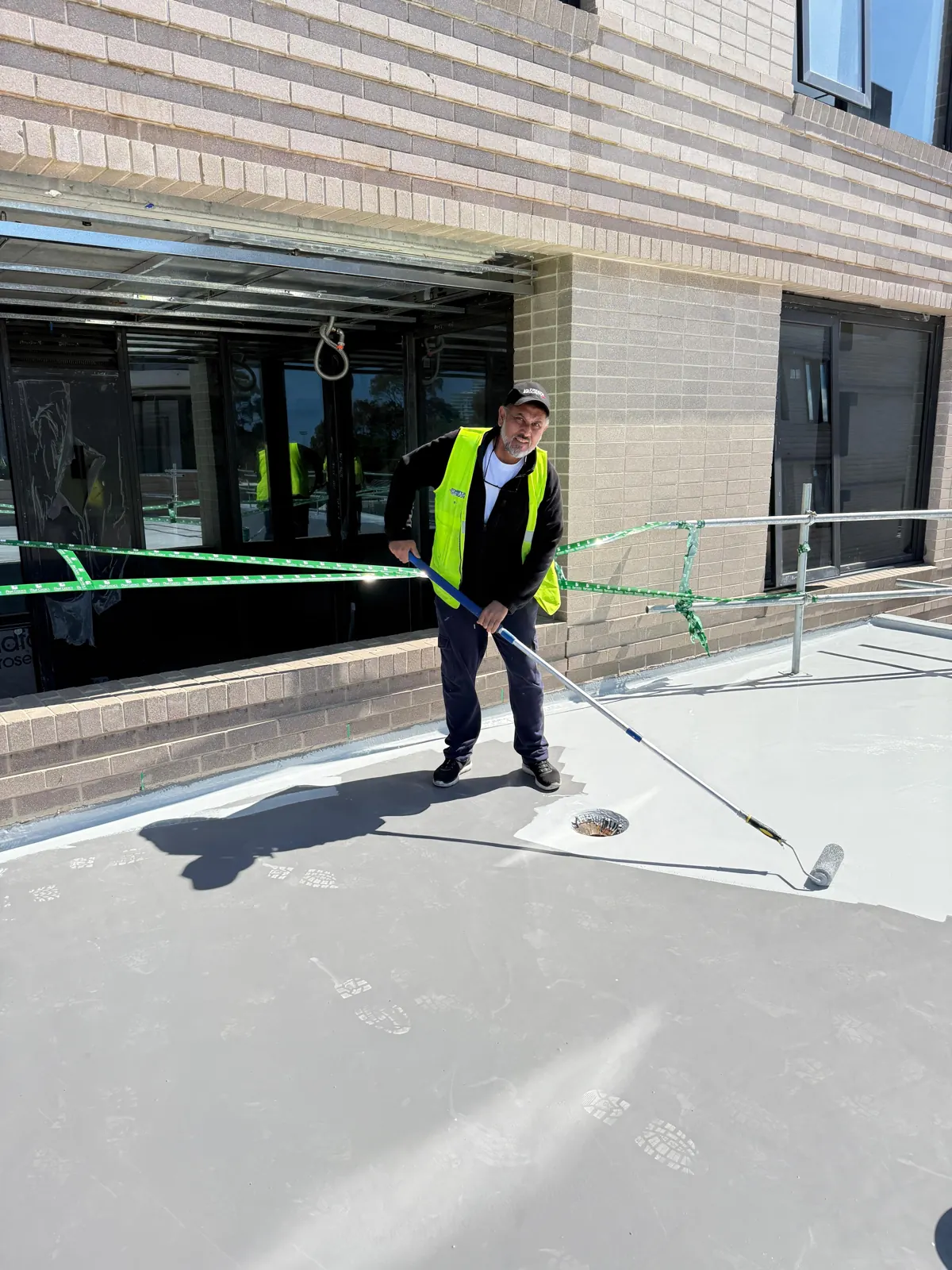 Balcony waterproofing membrane being applied in Sydney